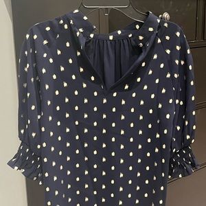 Navy Ted Baker blouse with gold polka dots.